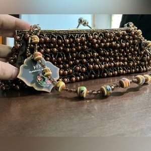 NWT - Beautiful beaded brown purse with silver clasp